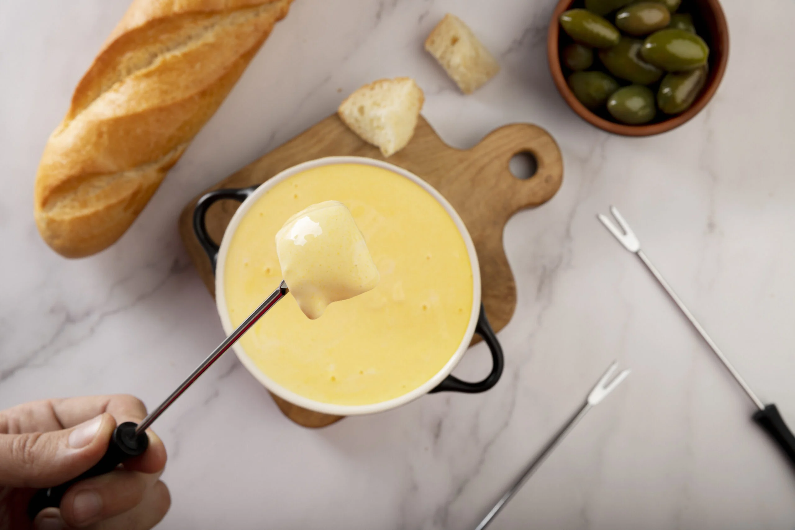Fondue de queijo cremoso